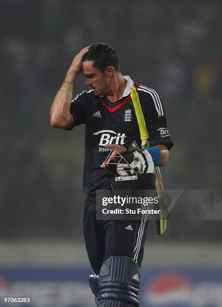 England batsman Kevin Pietersen walks off after being dismissed during the 2nd ODI between Bangladesh and England at Shere-e-Bangla National Stadium...