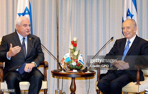 In this handout image supplied by the Israeli Government Press Office , Israeli President Shimon Peres meets with the President of the Republic of...