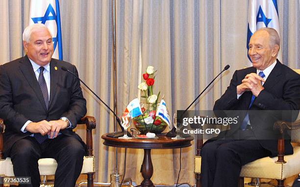 In this handout image supplied by the Israeli Government Press Office , Israeli President Shimon Peres meets with the President of the Republic of...