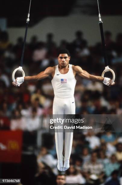 Curtis Holdsworth of the United States competes on the still rings during a USA - USSR gymnastics meet on April 24, 1988 at the Arizona Veterans...