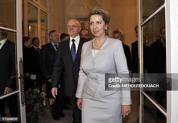 Russian first lady Svetlana Medvedeva arrives with Farid Mukhametshin, head of Russian Federal Agency Rossotrudnitchestvo to visit the exhibition...