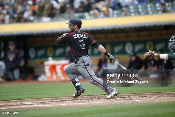 Daniel Descalso of the Arizona Diamondbacks bats during the game against the Oakland Athletics at the Oakland Alameda Coliseum on May 26, 2018 in...