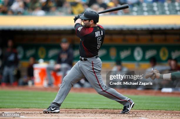 Alex Avila of the Arizona Diamondbacks bats during the game against the Oakland Athletics at the Oakland Alameda Coliseum on May 26, 2018 in Oakland,...