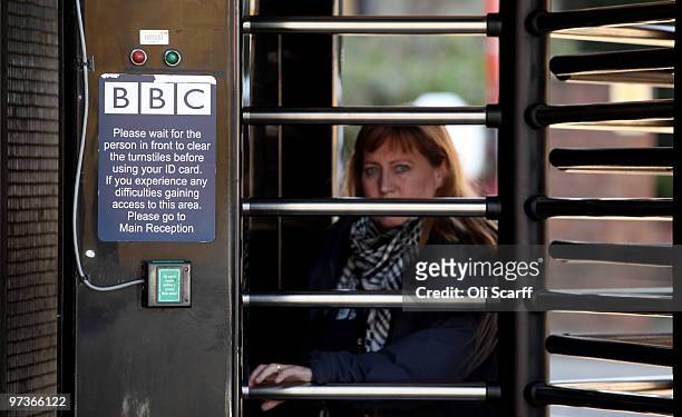 Employee leaves Television Centre on March 2, 2010 in London, England. The corporation have today published their strategy review which proposes the...