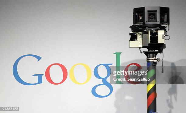 The camera of a German Google Street View car looms over the car next to the Google logo at the Google stand at the CeBIT Technology Fair on March 2,...