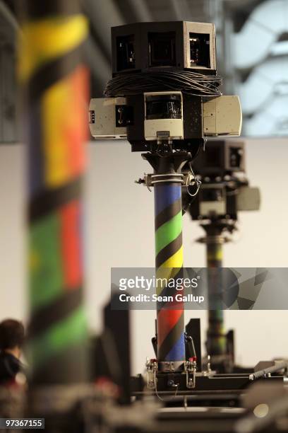 The cameras of German Google Street View cars loom over the cars at the Google stand at the CeBIT Technology Fair on March 2, 2010 in Hannover,...