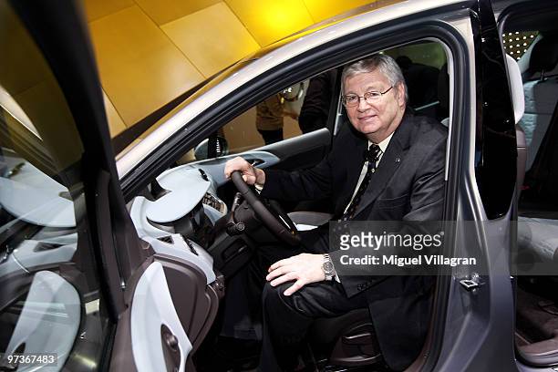 Nick Reilly, chief executive officer of Adam Opel GmbH, poses inside an Opel Meriva during the first press day at the 80th Geneva International Motor...