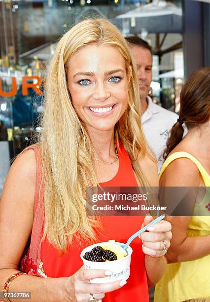 Actress Denise Richards enjoys Yogen Fruz during the EB Medical Research Foundation picnic hosted by Courteney Cox and James Marsden held at The...