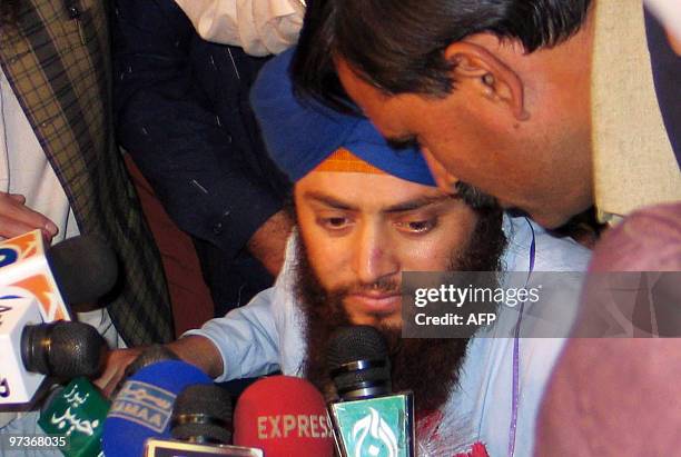 Injured freed Pakistani Sikh, Sirjeeth Singh talks with media representatives in Peshawar on March 2, 2010. Two Sikhs kidnapped for ransom in...