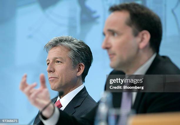 Bill McDermott, co-chief executive officer of SAP AG, left, and Jim Hagemann Snabe, co-chief executive officer of SAP AG, speak at a press conference...