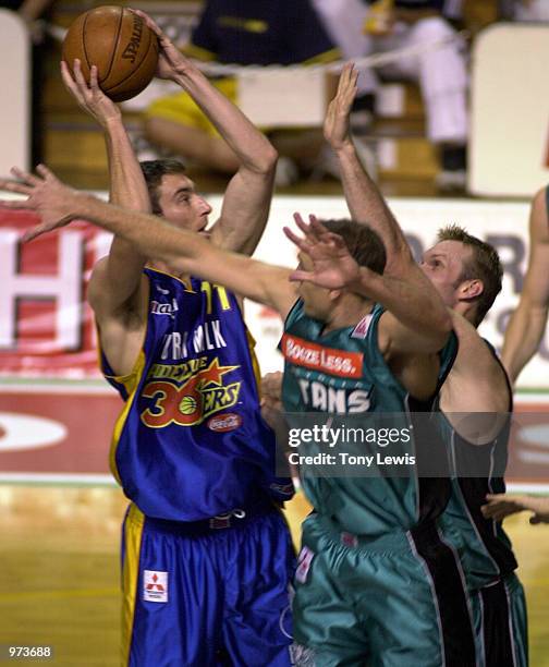 Jason Smith for Adelaide shoots in the match between the Adelaide 36ers and the Melbourne Titans played at the Clipsal Powerhouse i n Adelaide,...