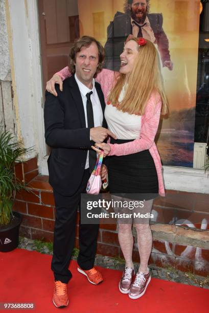 Oliver Korittke and Mirijam Verena Jeremic attend the film preview of 'Der Sportpenner' on June 13, 2018 in Berlin, Germany.