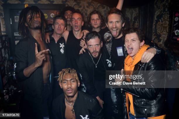 Seye Adelekan, Noel Gallagher, Twiggy Garcia, Young Lazarus, Jeff Wootton, Jamie Reynolds, Jay Sharrock, Marc Jacques Burton and Tom Holland pose...