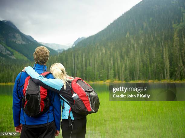 hiking couple  - john p kelly stock pictures, royalty-free photos & images