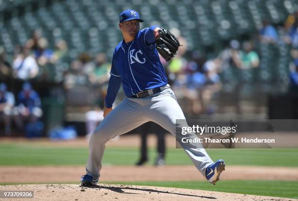 Brad Keller of the Kansas City Royals pitches against the Oakland Athletics in the bottom of the first inning at the Oakland Alameda Coliseum on June...