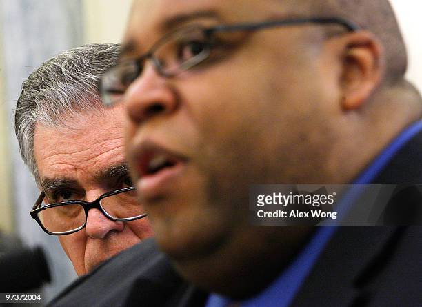 National Highway Traffic Safety Administration Administrator David Strickland speaks as Secretary of Transportation Ray LaHood looks on during a...