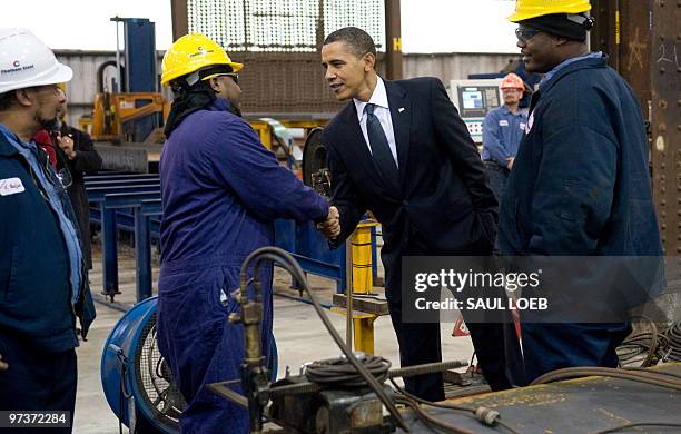 President Barack Obama shakes hands with employees during a tour of Chatham Steel in Savannah, Georgia, March 2, 2010. Obama traveled to the area for...