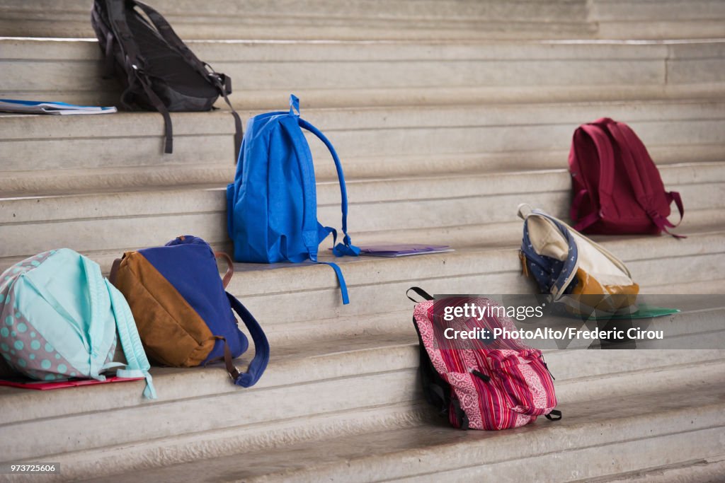 Backpacks left on bleachers