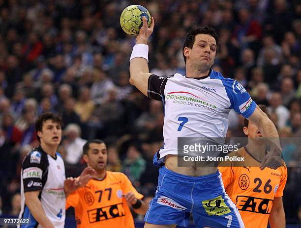 Matthias Flohr of Hamburg scores during the Bundesliga match between HSV Hamburg and VfL Gummersbach at the Color Line Arena on March 2, 2010 in...