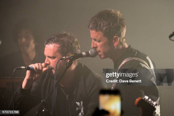 Twiggy Garcia and Jamie Reynolds of YOTA perform with Noel Gallagher in concert at XOYO on June 13, 2018 in London, England.