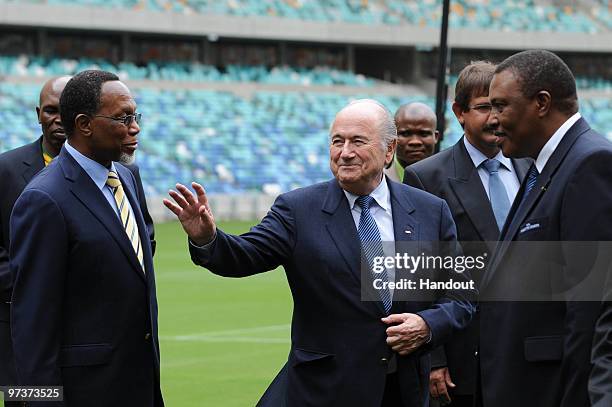 In this handout image provided by the 2010 FIFA World Cup Organising Committee for South Africa, FIFA President Joseph Sepp Blatter ,Deputy President...