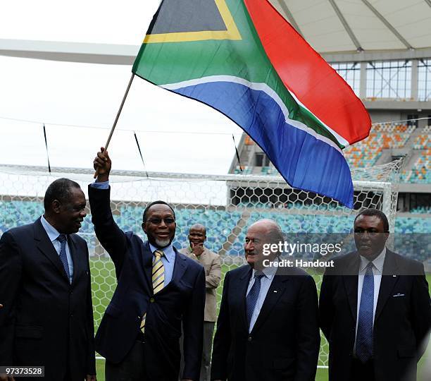 In this handout image provided by the 2010 FIFA World Cup Organising Committee for South Africa, FIFA President Joseph Sepp Blatter, Deputy President...