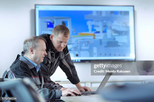 engineers with cad drawing in metal pressing factory - cad drawing stock pictures, royalty-free photos & images