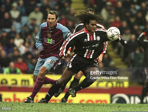 Christian Karembeu of Middlesbrough gets past Paul Marson of Villa during the match between Aston Villa v Middlesbrough in the FA Carling Premiership...