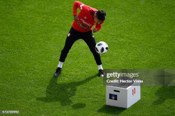 Raul Ruidiaz of Peru heads the ball during a training session at Arena Khimki on June 12, 2018 in Khimki, Russia.