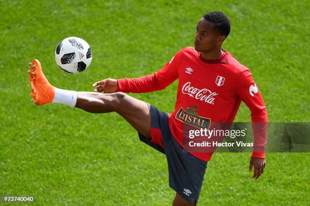 Andy Polo of Peru controls the ball during a training session at Arena Khimki on June 12, 2018 in Khimki, Russia.
