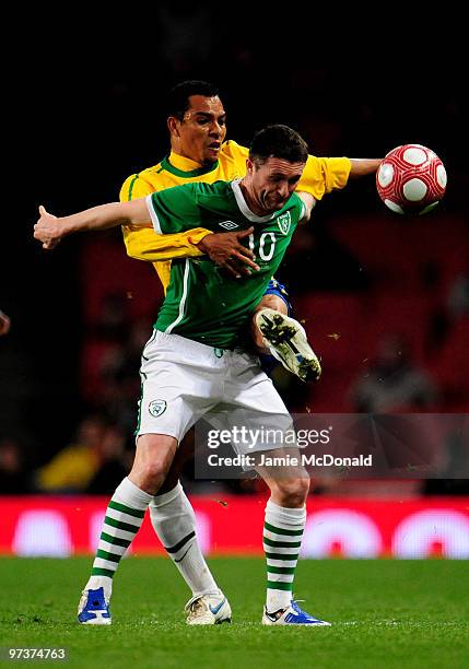 Robbie Keane of Ireland battles with Lucio of Brazil during the International Friendly match between Republic of Ireland and Brazil played at...