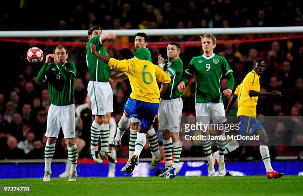 Michel Bastos of Brazil takes a free kick during the International Friendly match between Republic of Ireland and Brazil played at Emirates Stadium...