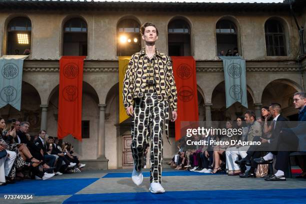 Model walks the runway at the Roberto Cavalli show during the 94th Pitti Immagine Uomo on June 13, 2018 in Florence, Italy.