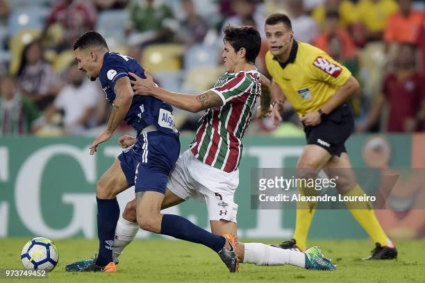 Pedro Santos of Fluminense struggles for the ball with Alison of Santos during the match between Fluminense and Santos as part of Brasileirao Series...