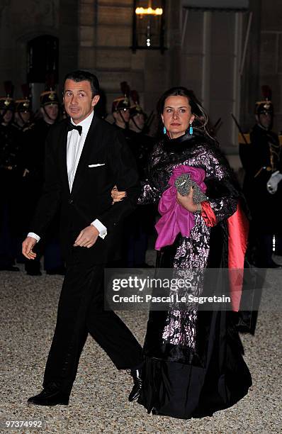 Francois Sarkozy arrives to attend a state dinner honouring visiting Russian President Dmitry Medvedev at the Elysee Palace on March 2, 2010 in...