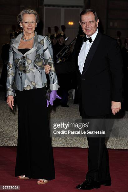 French Interior Minister Michelle Alliot-Marie arrives with husband to attend a state dinner honouring visiting Russian President Dmitry Medvedev at...