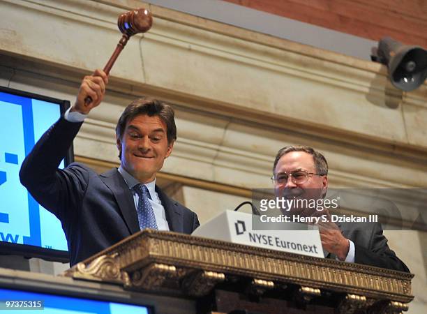Dr. Mehmet Oz and Senior Vice President of Corporate Communications NYSE Rich Adamonis ring the closing bell at the New York Stock Exchange on March...