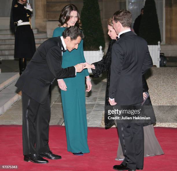 French President Nicolas Sarkozy, Carla Bruni-Sarkozy, Svetlana Medvedeva and Russian President Dmitry Medvedev pose as they arrive to attend a state...