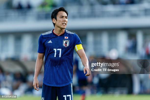 Makoto Hasebe of Japan gestures during the international friendly match between Switzerland and Japan at the Stadium Cornaredo on June 8, 2018 in...