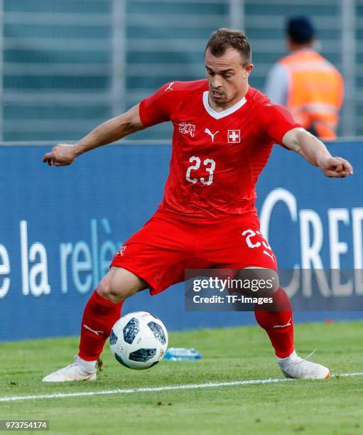 Xherdan Shaqiri of Switzerland controls the ball during the international friendly match between Switzerland and Japan at the Stadium Cornaredo on...