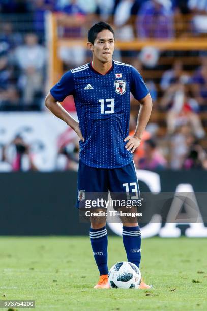 Yoshinori Muto of Japan looks on during the international friendly match between Switzerland and Japan at the Stadium Cornaredo on June 8, 2018 in...