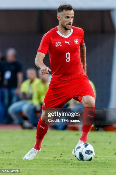 Haris Seferovic of Switzerland controls the ball during the international friendly match between Switzerland and Japan at the Stadium Cornaredo on...