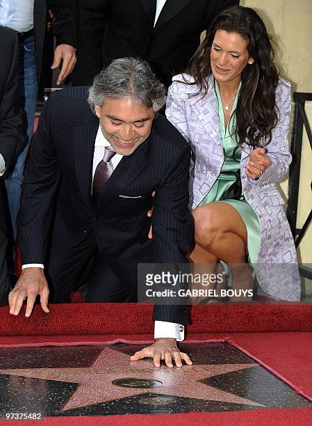 Italian tenor Andrea Bocelli poses with his wife Veronica Berti after being honored with a star on the Hollywood Walk of Fame, in Hollywood,...