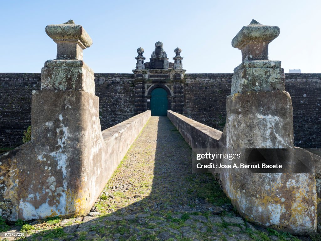 Bridge of entry to the Castle and moat of the Castle of Saint John the Baptist. Terceira Island in the Azores Islands, Portugal.