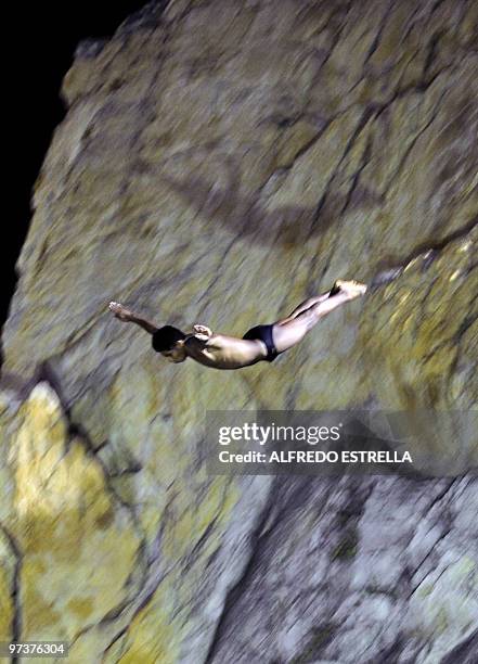 Cliff diver jumps from 'La Quebrada' cliff in Acapulco, Mexico, on March 1, 2010. The tradition of 'La Quebrada' goes back to 1934, when two...