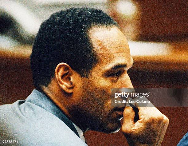 Simpson confers is shown in court during a pre-trial hearing January 12, 1995.