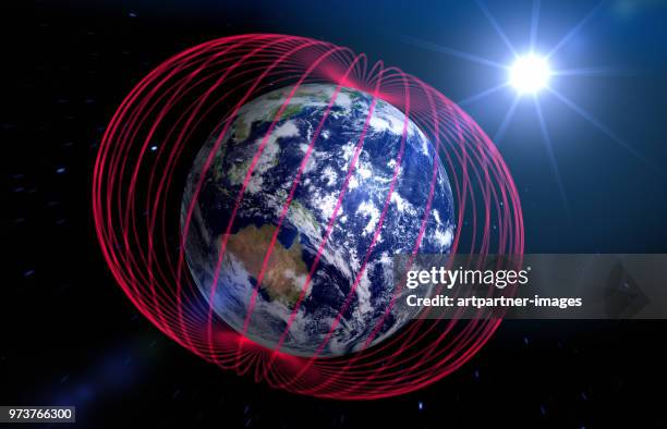earth's magnetic field - magnetisch veld stockfoto's en -beelden