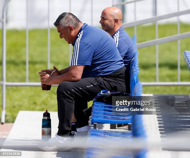 President of AFA Claudio Tapia talks to Jorge Sampaoli coach of Argentina during a training session at Training site at Stadium of Syroyezhkin Sports...
