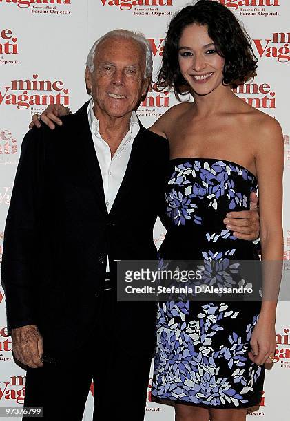 Giorgio Armani and Nicole Grimaudo attend the 'Mine Vaganti' Milan Premiere held at Cinema Anteo on March 2, 2010 in Milan, Italy.