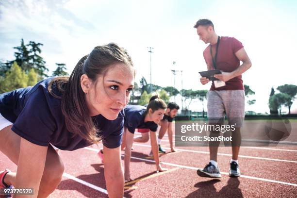 runners and coach - running coach stock pictures, royalty-free photos & images